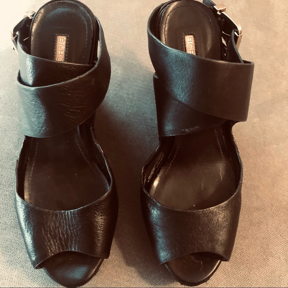 BCBG genuine leather black wedge shoes.See photos for wear.Double strap,open toe